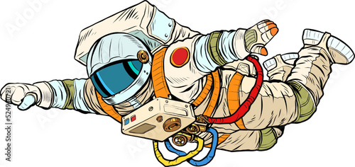 An astronaut in a spacesuit flies forward like a superhero. Weightlessness