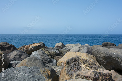 Big stones in front of the open sea