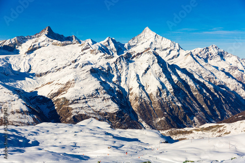 View of the picturesque mountain peaks in winter  located near the popular resort of Zermatt  Switzerland