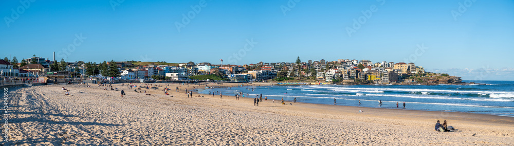Bondi beach-goers enjoying a sunny mid-winter day