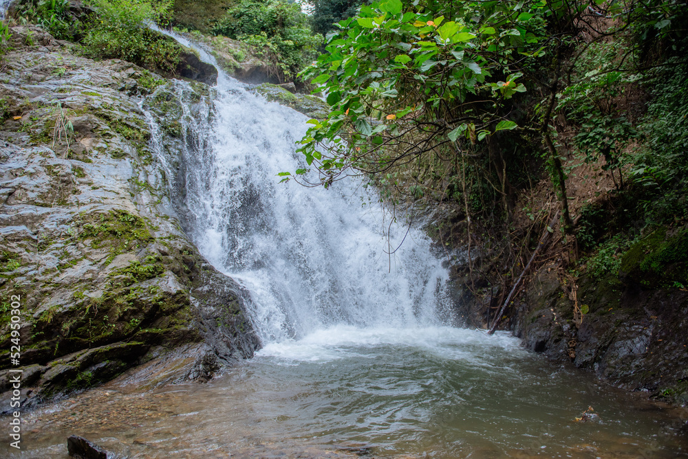 Visit a waterfall in the valley.