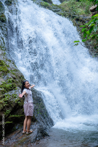 A vacation to a waterfall in the middle of the forest in the high valley.