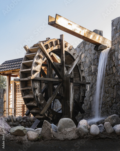 Photo Japanese watermill in the garden
