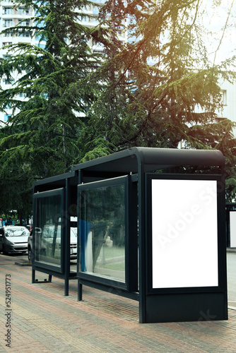 Fototapeta Naklejka Na Ścianę i Meble -  Blank advertising board on transport stop. Space for design