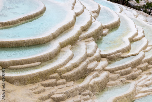 The  beautiful travertine landscape in Baishui Platform scenic spot in Diqing Tibetan Autonomous Prefecture Yunnan province, China. photo