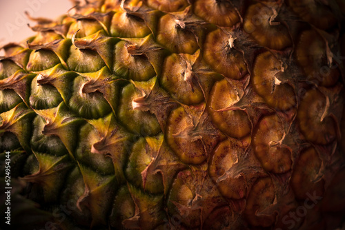 Pineapple, a sweet multiple fruit. Ananas comosus. This sample grows in Asia, Philippines. Vegan vegetarian option. Detail of eyes, arranged in Fibonacci structure mathematical nature photo