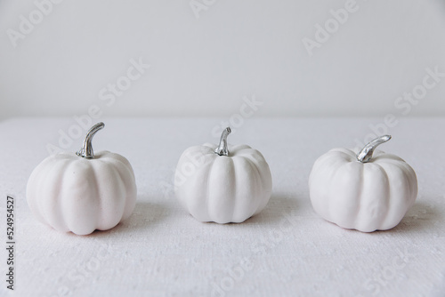 Thanksgiving set. Three pumpkins on the table for Thanksgiving, mockup.