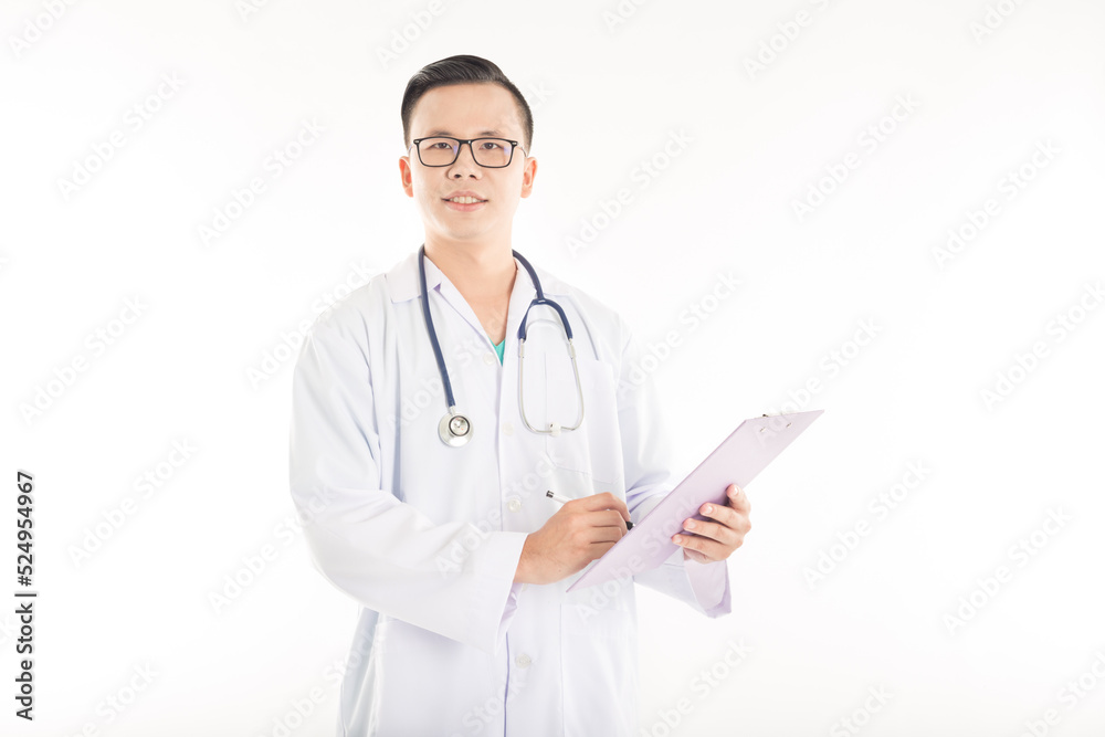 Asian doctor holding patient chart on white background, he write treatment order Asian doctor holding patient chart on white background, he write treatment order