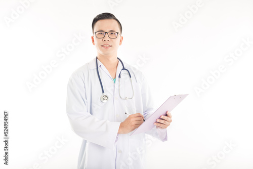 Asian doctor holding patient chart on white background, he write treatment order