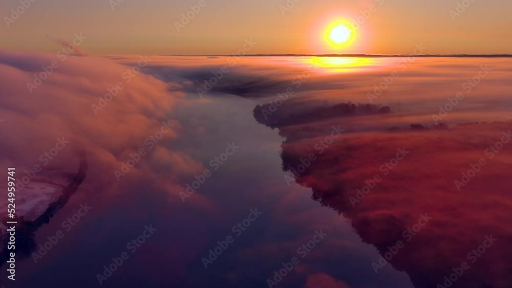 Fog rising from warm humid landscape with beautiful river, on a cool morning, at sunrise.
Fog rising from warm humid landscape with beautiful river, on a cool morning, at sunrise.