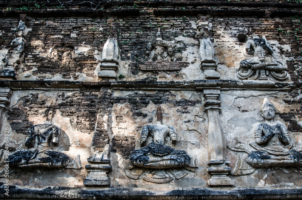 Ancient story angels on temple wall, Art on the stone about Buddha story on temple wall