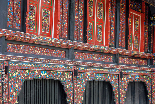 Decorative patterns and architectural detail view of Gadang house (rumah gadang) photo