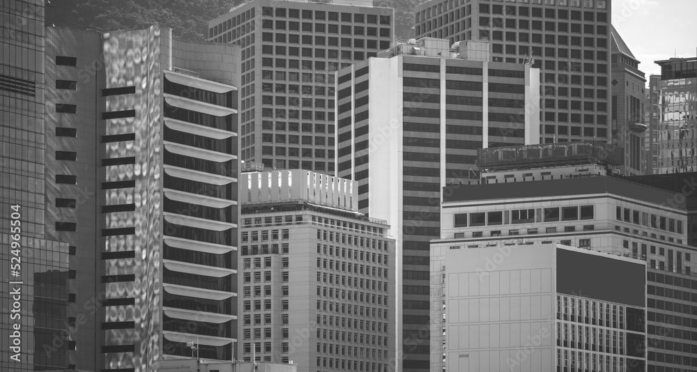 Hong Kong Commercial Building Close Up; black and white color Hong Kong Commercial Building Close Up; black and white color