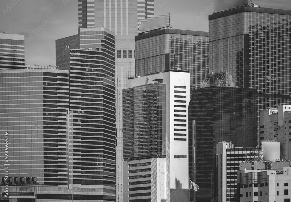 Hong Kong Commercial Building Close Up; black and white color Hong Kong Commercial Building Close Up; black and white color