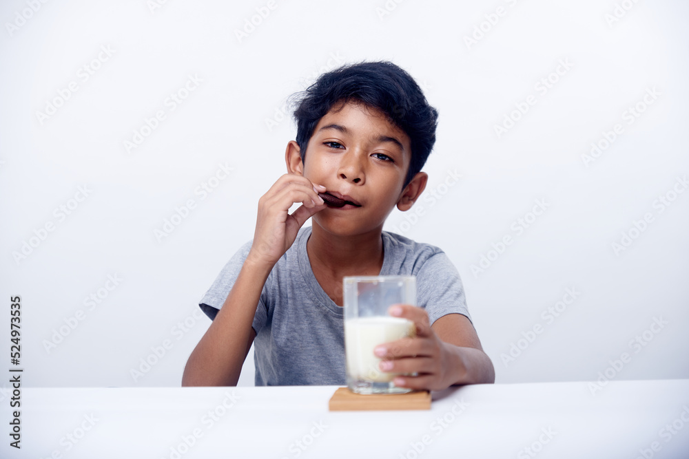 Little Boy drinking milk with fresh homemade Cocolate cookies Little Boy drinking milk with fresh homemade Cocolate cookies
