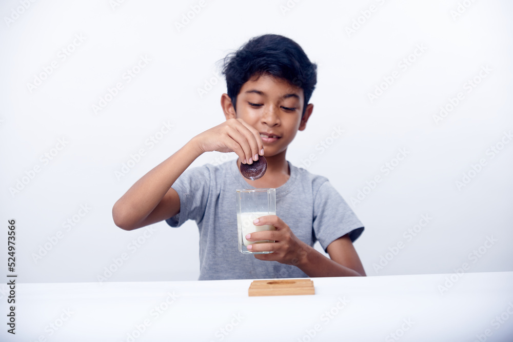 Little Boy drinking milk with fresh homemade Cocolate cookies Little Boy drinking milk with fresh homemade Cocolate cookies