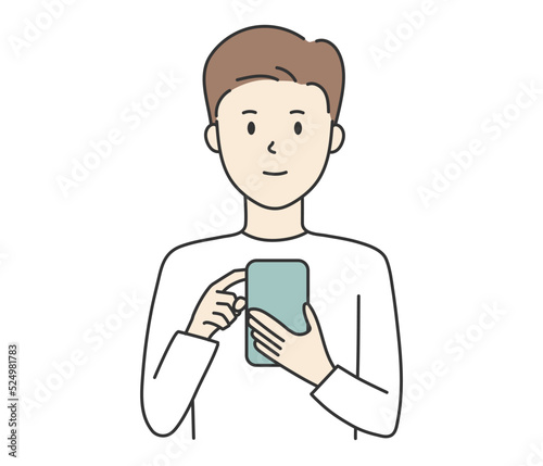 Man smiling while looking at smartphone.