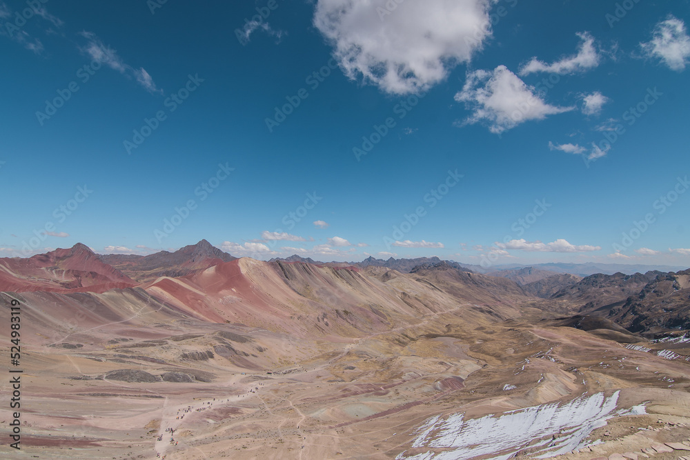 Fototapeta premium Amazing Mountainous Landscape In Peru.photography of huaraz peru, with people with hiking clothes, lakes, mountains, colors, rainbow mountain.