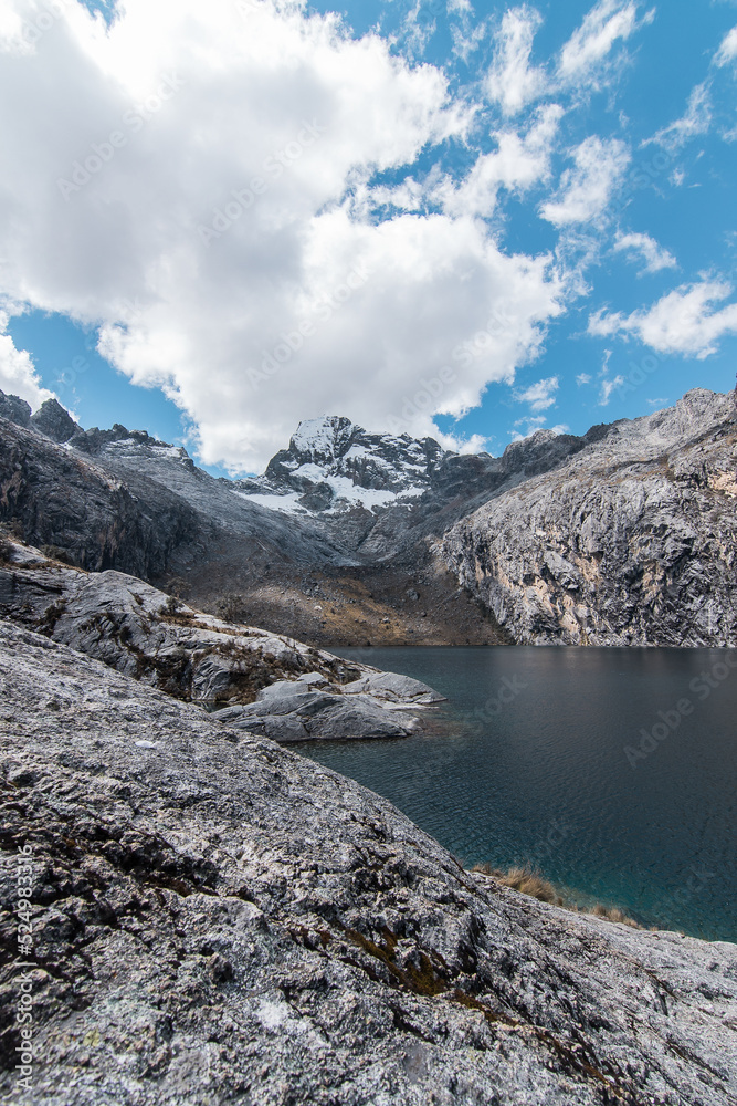 Amazing Mountainous Landscape In Peru.

photography of huaraz peru, with people with hiking clothes, lakes, mountains, colors, rainbow mountain.