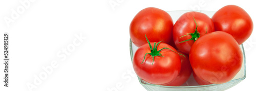 ripe tomatoes in a glass bowl. the concept of growing tomatoes. 
