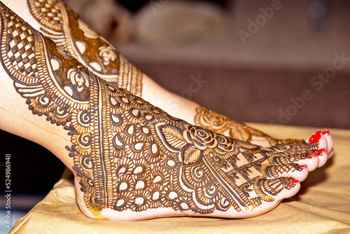 henna design on Bride's feet on her wedding eve.