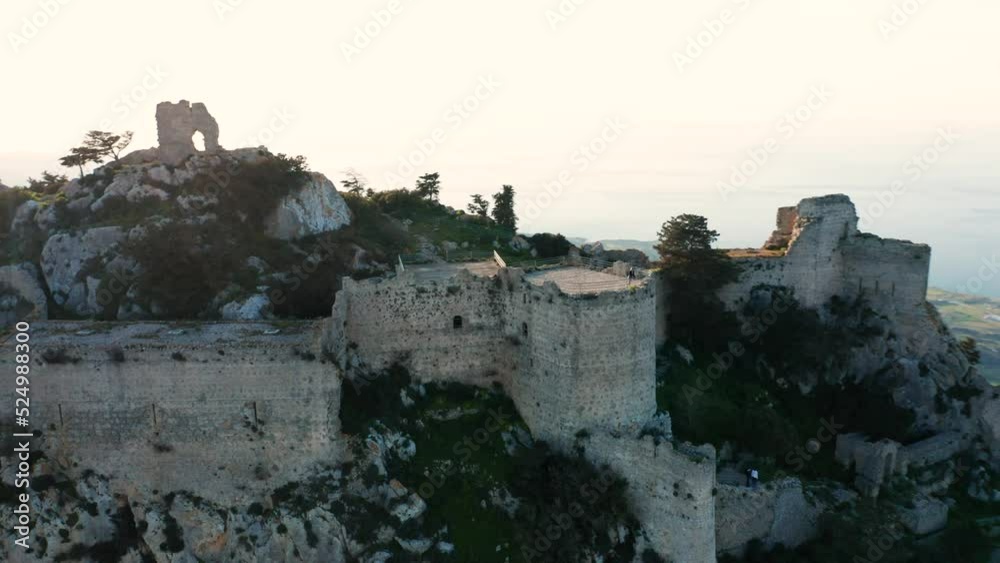 Aerial circle shot of ruins of Kantara Castle on rocky hill, Cyprus Aerial circle shot of ruins of Kantara Castle on rocky hill, Cyprus