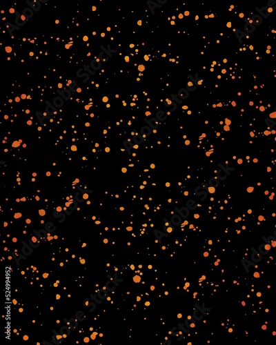 Orange speckled, grungy, splattered texture. Black background. Dark moody backdrop. Asset for greeting, invitation card, banner, montage, collage. Halloween and autumn concept.