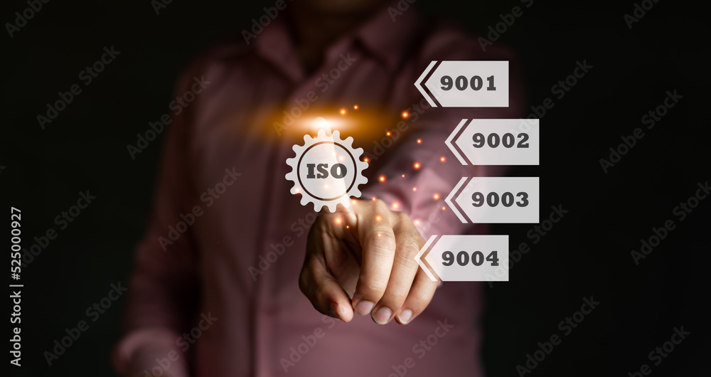 Fototapeta premium A businessman touch the ISO certificate icon, ISO 9000 system, arrow label computer graphic light, standard quality document control for organization and industry management products