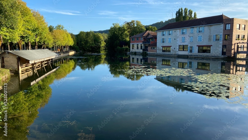 Beautiful reflections of houses in Bar sur Aube in France on August 2022