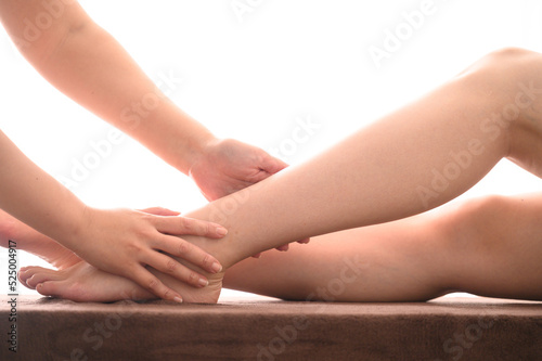 Image of esthetician and feet in esthetics