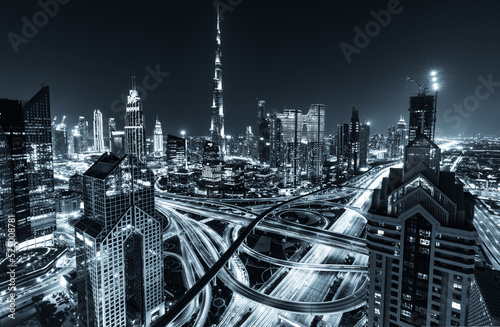 Foto Burj Khalifa in Dubai downtown skyscrapers highrise architecture at night