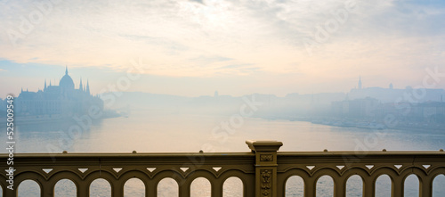 Danube river and Hungarian Parliament building in fog