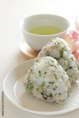 Japanese food, dried small sardines fish and green leaves vegetable mixed rice ball
