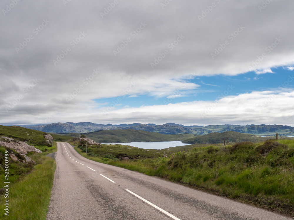 UK, Scotland, Clouds over empty asphalt road in Northwest Highlands UK, Scotland, Clouds over empty asphalt road in Northwest Highlands