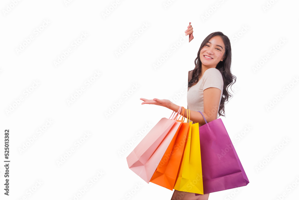 Asian woman holding shopping bags in full body isolated on white background, Shopper or shopaholic concept promotion online shopping credit card white background Asian woman holding shopping bags in full body isolated on white background, Shopper or shopaholic concept promotion online shopping credit card white background