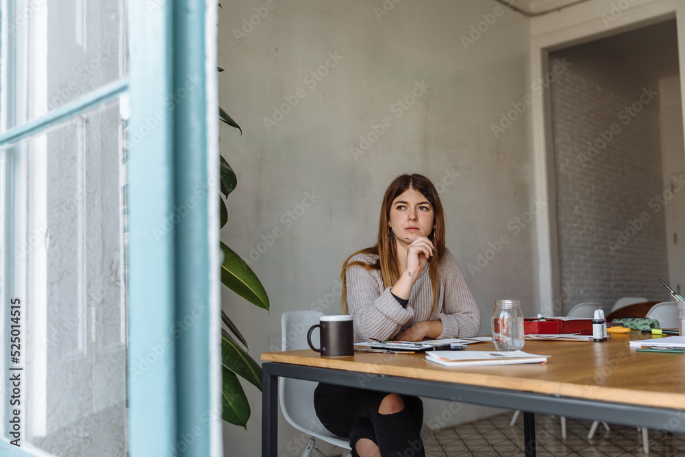 Artist thinking while drawing Artist thinking while drawing