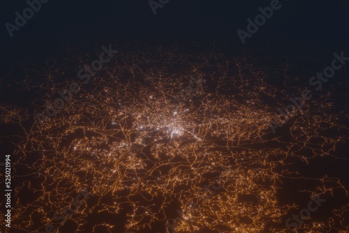 Aerial shot on Antananarivo (Madagascar) at night, view from west. Imitation of satellite view on modern city with street lights and glow effect. 3d render