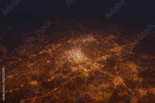 Aerial shot of Murcia (Spain) at night, view from north. Imitation of satellite view on modern city with street lights and glow effect. 3d render