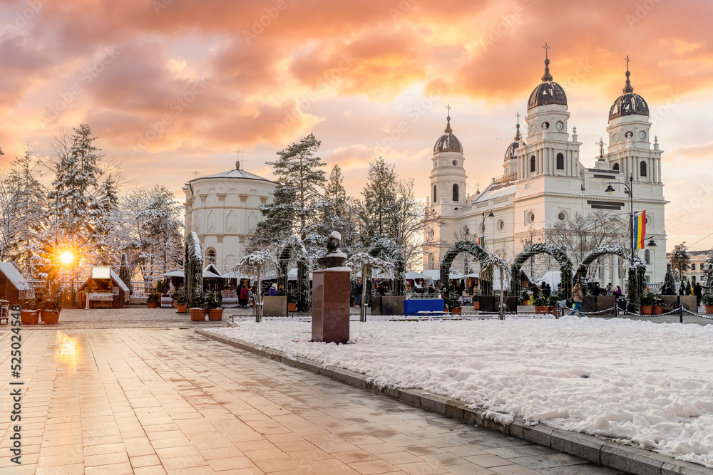 Christmas market and decorations tree in center of Iasi town at sunset, Romania