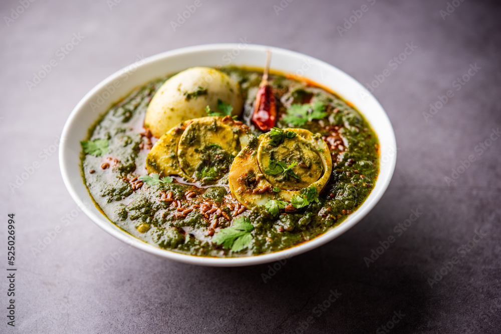Spinach egg curry is an Indian non vegetarian dish made using palak gravy with eggs Spinach egg curry is an Indian non vegetarian dish made using palak gravy with eggs