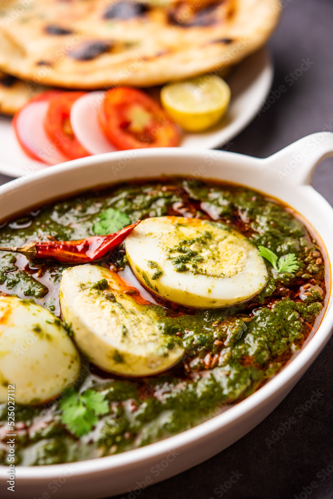 Spinach egg curry is an Indian non vegetarian dish made using palak gravy with eggs Spinach egg curry is an Indian non vegetarian dish made using palak gravy with eggs