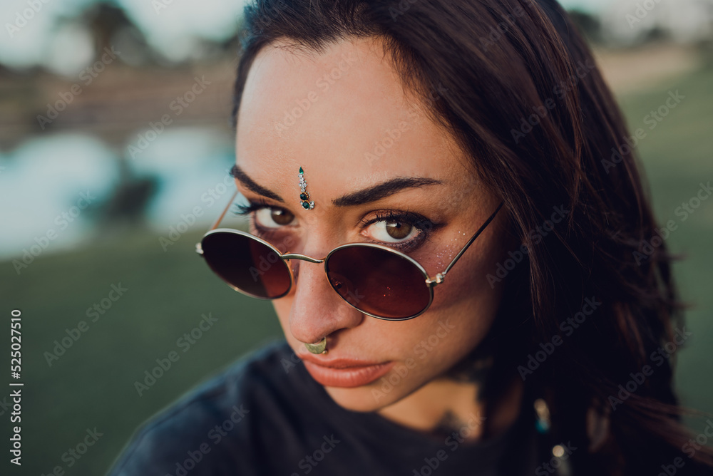 Magnificent trendy adult woman in sunglasses Magnificent trendy adult woman in sunglasses