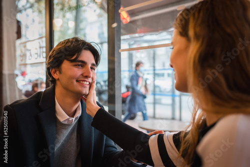 Happy couple having date in cafe