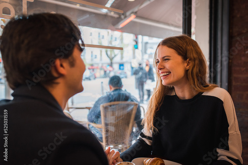 Happy couple having date in cafe