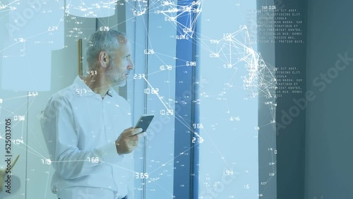 Animation of network of connections over caucasian businessman using smartphone photo