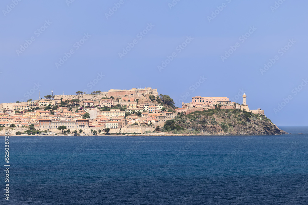 Panoramic view from the sea to Portoferraio city with its legendary buildings that made up its history - Forte Falcone, Forte Stella, and Lighthouse, Province of Livorno, Island of Elba, Italy