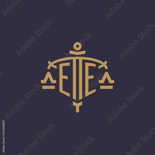 Monogram EE logo for legal firm with geometric scale and sword style