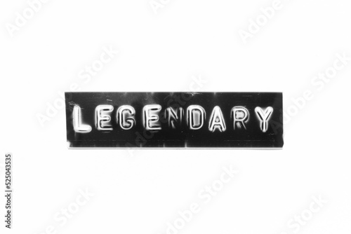 Fotografi Embossed letter with word legendary in black banner on white paper background