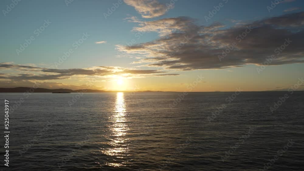 Sunset with Boat on the horizon in slow motion Sunset with Boat on the horizon in slow motion