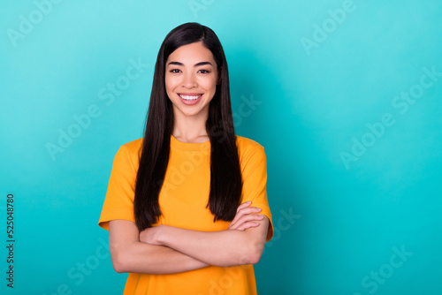 Photo of funny brunette long hairdo lady crossed hands wear yellow t-shirt isolated on teal color background